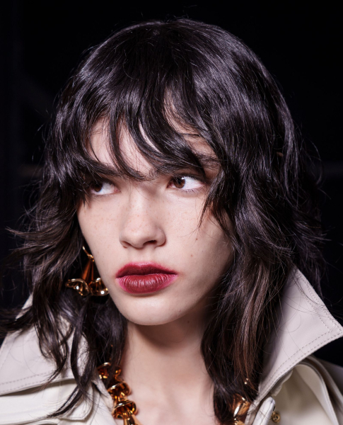 Image may contain Head Person Face Photography Portrait Black Hair Hair Adult Cosmetics and Lipstick