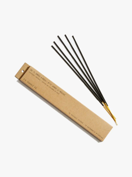 P.F. Candle Co. Amber & Moss Incense Sticks in branded components on a light gray background
